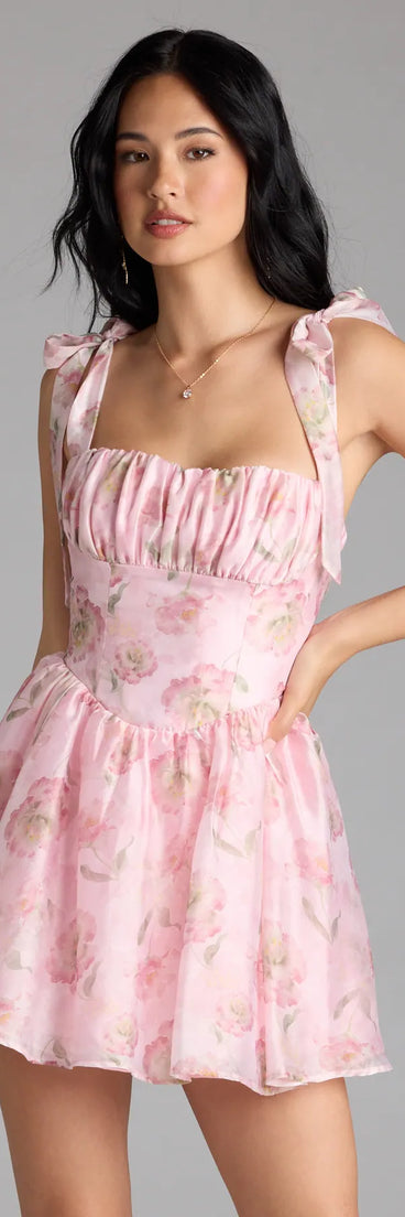 Feel instantly put-together in the Leoni Lace-Up Corset Floral Skater Dress in pink, a stylish wedding guest dress designed for confident style and all-out celebration.