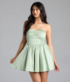 Own the evening in the Lorena Satin Strapless Skater Dress in sage green, a summer cocktail dress perfect for rooftop parties and stylish soirées.