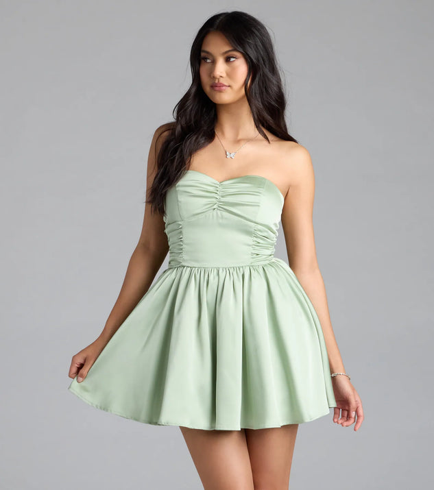 Own the evening in the Lorena Satin Strapless Skater Dress in sage green, a summer cocktail dress perfect for rooftop parties and stylish soirées.