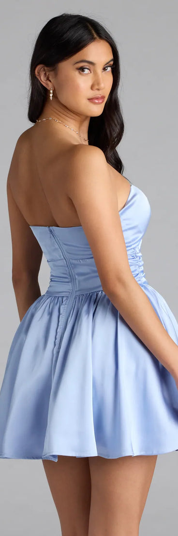 Own the spotlight in the Lorena Satin Strapless Skater Dress, a light blue formal dress crafted to deliver luxe style for fall weddings, military balls, or any special event.