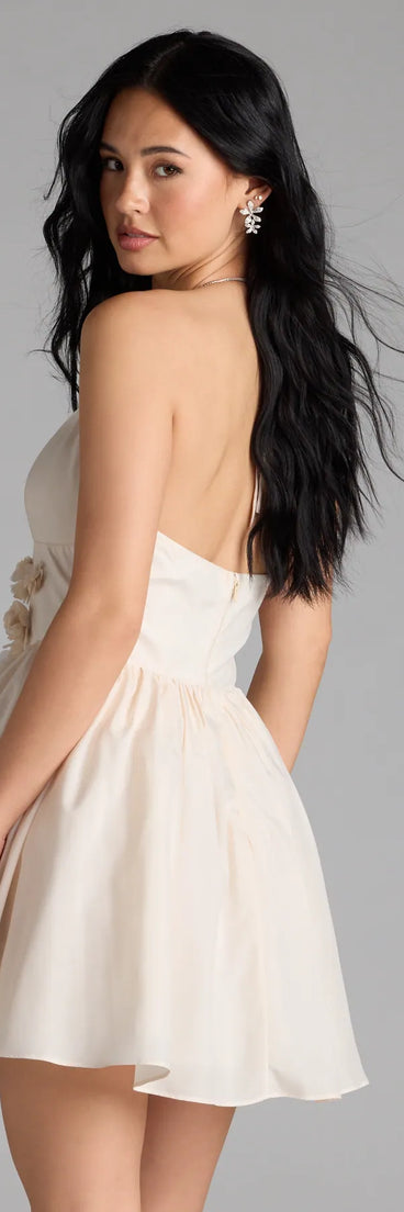 Shine with confidence, elegance, and standout style in the Jadie Open Back Floral Skater Dress—a ivory graduation dress designed with a fresh silhouette and the latest trends.