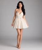 Shine with confidence, elegance, and standout style in the Jadie Open Back Floral Skater Dress—a ivory graduation dress designed with a fresh silhouette and the latest trends.