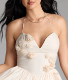 Shine with confidence, elegance, and standout style in the Jadie Open Back Floral Skater Dress—a ivory graduation dress designed with a fresh silhouette and the latest trends.