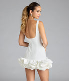 Own every entrance in the Ellerie Low Back Ruffle Bubble Short Dress, a white party dress perfect for milestone birthdays and grad parties, or dancing through summer nights and unforgettable bachelorette celebrations.