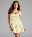Shine with confidence, elegance, and standout style in the Elida Lace-Up Skater Satin Short Dress—a yellow graduation dress designed with a fresh silhouette and the latest trends.