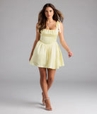 Shine with confidence, elegance, and standout style in the Elida Lace-Up Skater Satin Short Dress—a yellow graduation dress designed with a fresh silhouette and the latest trends.