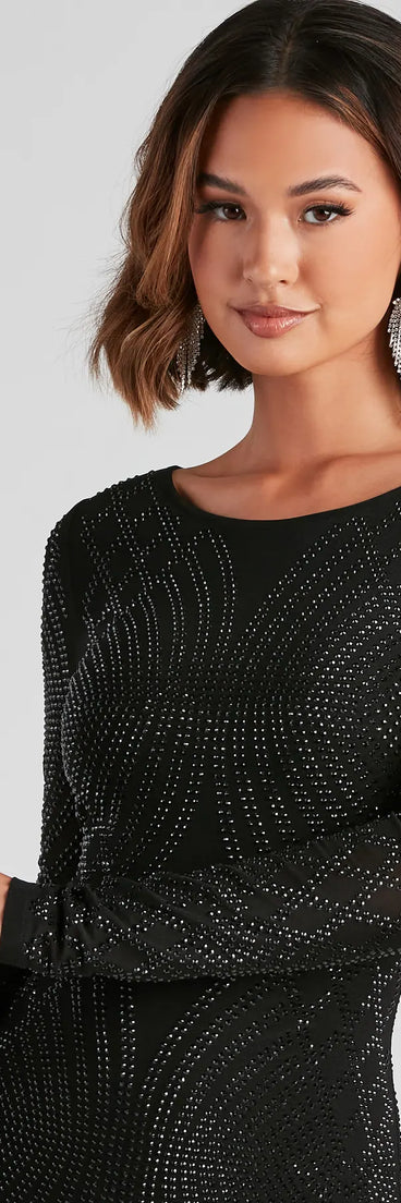 Revamp your 2025 wardrobe with this chic addition, the Theresa Heat Of The Moment Dress in black, perfect for elevating your style in the new year.