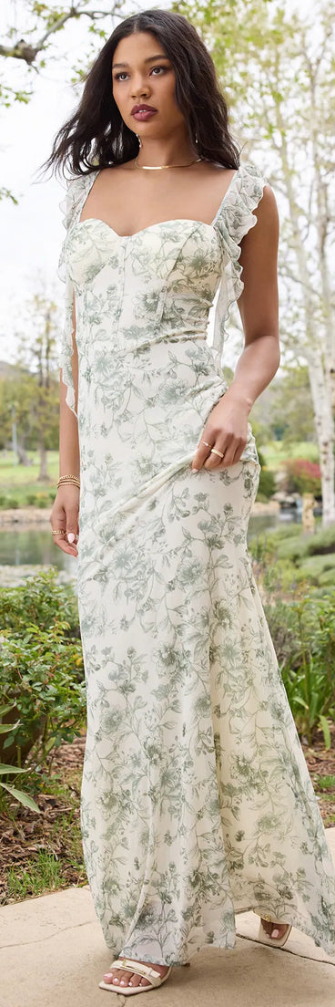 Step into summer looking effortlessly chic in the Melita Ruffle Mermaid Floral Mesh Formal Dress in sage green, a must-have Windsor dress for your warm-weather wardrobe.