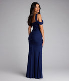 A stunning pick for an engagement photoshoot outfit or autumn wedding guest dress, this fall formal dress showcases the Fay Off The Shoulder Faux Pearl Mermaid Dress in navy blue with a graceful silhouette that captures the moment.