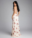 Own the spotlight in the Madeline Floral Strappy Back A-Line Formal Dress, a ivory formal dress crafted to deliver luxe style for summer weddings, Army Balls, or any special event.