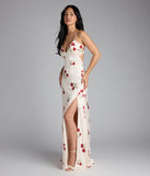 Own the spotlight in the Madeline Floral Strappy Back A-Line Formal Dress, a ivory formal dress crafted to deliver luxe style for summer weddings, Army Balls, or any special event.