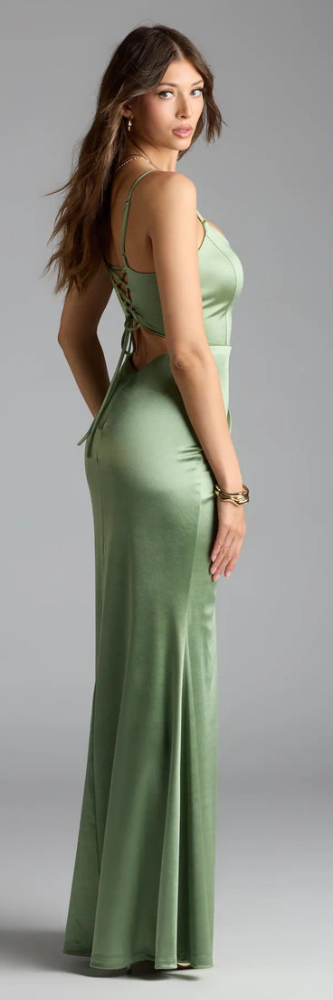 Own the spotlight in the Alaine Lace-Up Slit Mermaid Satin Formal Dress, a sage green formal dress crafted to deliver luxe style for autumn weddings, Military Balls, or any special event.