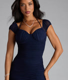 Feel instantly put-together in the Blossom Formal Halter Mermaid Dress in navy blue, a summer wedding guest dress designed for confident style and all-out celebration.