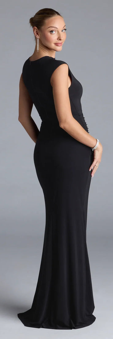 Turn heads at Prom 2025 in this black prom dress, where statement-making details meet the iconic style of the Deirdre Ruched High Slit Mermaid Dress.