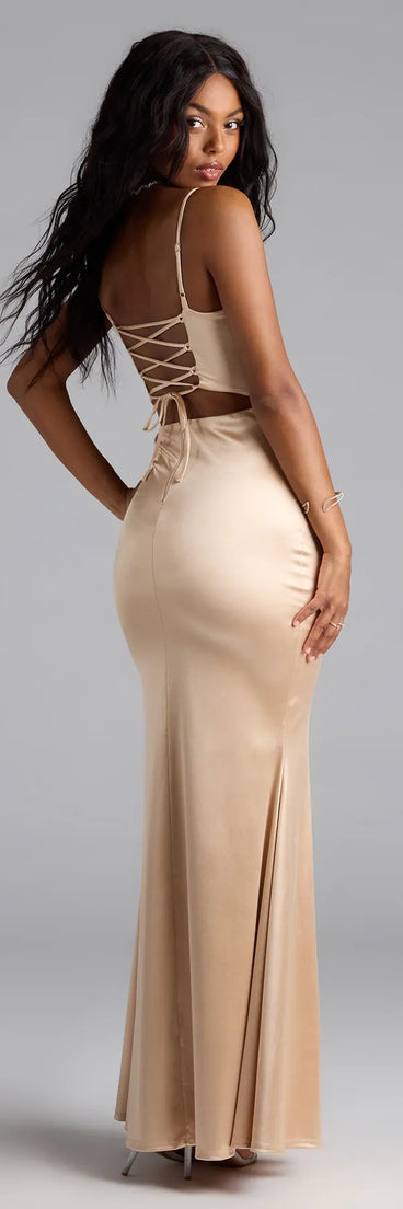 Own the spotlight in the Evalina Lace-Up Mermaid Dress, a gold formal dress crafted to deliver luxe style for autumn weddings, Military Balls, or any special event.