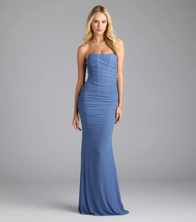 Step into summer looking effortlessly chic in the Kenzie Corset Mermaid Mesh Formal Dress in denim blue, a must-have Windsor dress for your warm-weather wardrobe.
