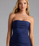 Step into summer looking effortlessly chic in the Anisley Strapless High Slit Column Formal Dress in navy blue, a must-have Windsor dress for your warm-weather wardrobe.