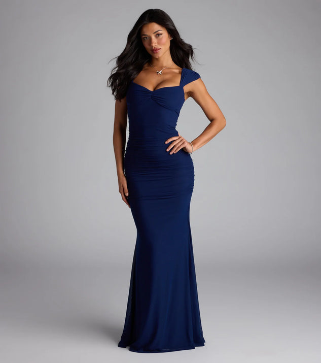 Own the spotlight in the Camren Lace-Up Mermaid Mesh Formal Dress, a navy blue formal dress crafted to deliver luxe style for summer weddings, Army Balls, or any special event.