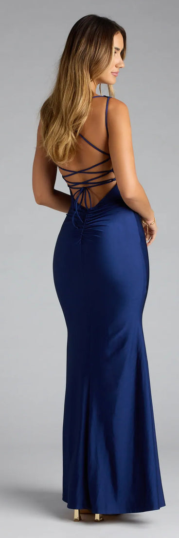 A stunning pick for an engagement photoshoot outfit or autumn wedding guest dress, this fall formal dress showcases the Gabriella Lace-Up Mermaid Formal Dress in navy blue with a graceful silhouette that captures the moment.