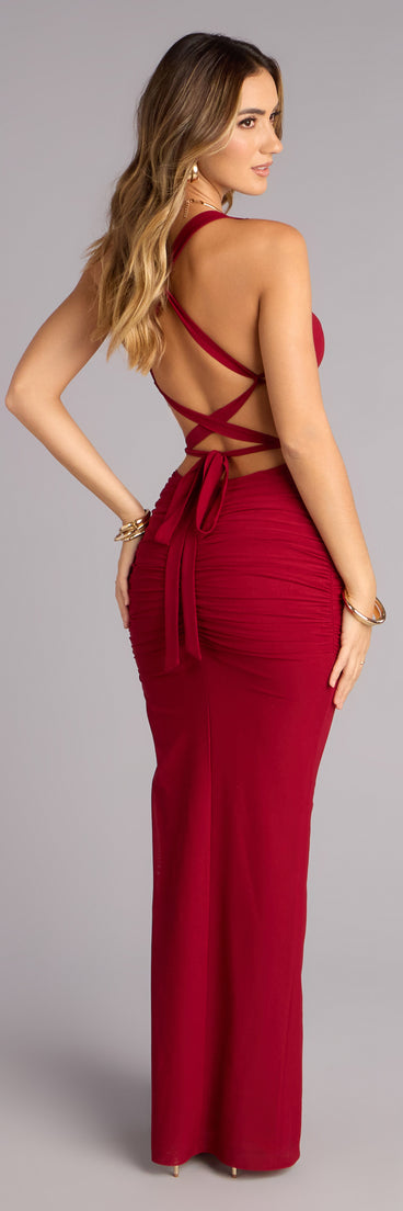 The Kristy Mesh Corset Lace-Up Slit Formal Dress is a burgundy prom dress that blends trend-forward design with a flattering fit, perfect for celebrating your night with confidence.