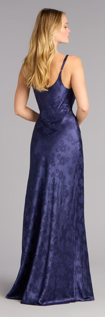 The Kensie Satin Cowl Neck Slit Formal Dress is a navy blue prom dress that blends trend-forward design with a flattering fit, perfect for celebrating your night with confidence.