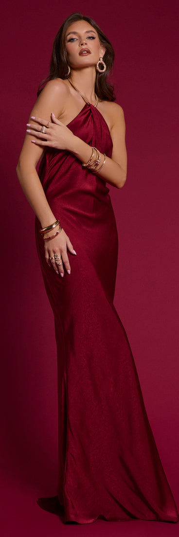 Choose the Meredith Satin Halter Open Back Formal Dress, a red prom dress for a flirty shape and glam finish that feels exciting, confident, and so you.