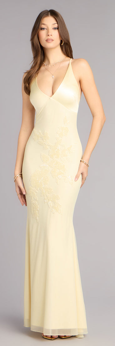 Shop a formal dress like the Adrian Beaded Floral Mermaid Dress in yellow, designed with a sleek silhouette, luxe fabric, and elegant detail for special events.