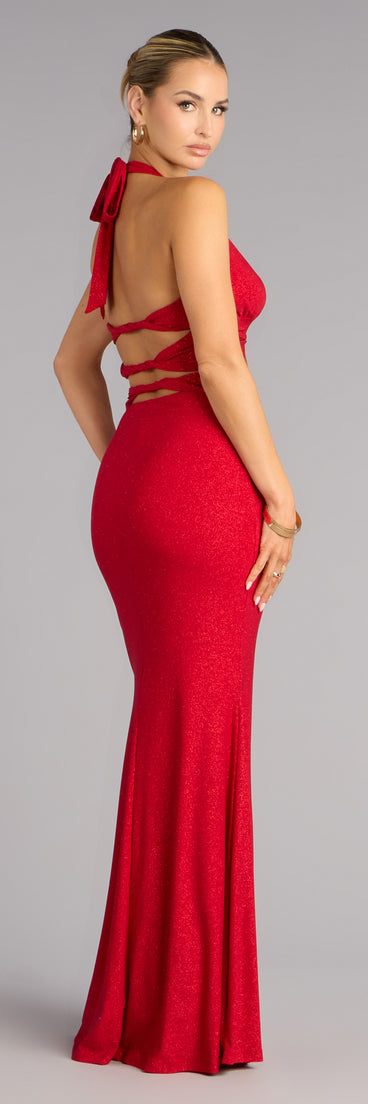 Own any NYE moment in the Maribeth Glitter Strappy Back Mermaid Formal Dress, a red glitter dress designed for bold, spotlight-stealing style.