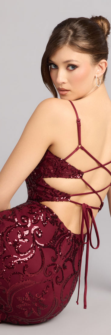 This wine prom dress, the Mari Sequin Lace-Up Formal Dress , features a sleek, floor-length design with trend-forward details that capture the excitement of Prom 2026.