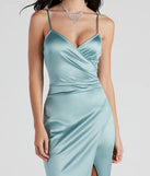 Revamp your 2025 wardrobe with this chic addition, the Jolina Wrap Skirt Satin Dress in sea foam, perfect for elevating your style in the new year.