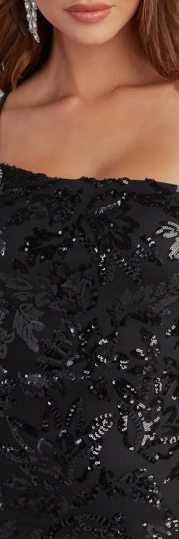 Own every entrance in the Meredith One-Shoulder Sequin Formal Dress, a black party dress perfect for milestone birthdays, homecoming dances, and unforgettable bachelorette celebrations.