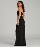 The Kaia Strapless High Slit Formal Dress is a show-stopping black prom dress, offering a sleek, slimming silhouette that enhances your natural beauty for an unforgettable night.