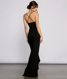 The Tiffany Sleeveless High Slit Formal Dress is a show-stopping black prom dress, offering a sleek, slimming silhouette that enhances your natural beauty for an unforgettable night.
