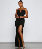 Turn heads at Prom 2025 in this black prom dress, where statement-making details meet the iconic style of the Trinity Formal High Slit Glitter Dress .