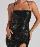 The Azalea Formal High Slit Sequin Dress is a show-stopping black prom dress, offering a sleek, slimming silhouette that enhances your natural beauty for an unforgettable night.