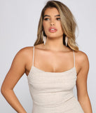 Make a bold statement in the Lola Formal High Slit Glitzy Glitter Dress in ivory, the perfect summer dress for weddings, cocktail hours, nights out, and/or seasonal celebrations.