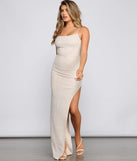 Turn heads at Prom 2025 in this ivory prom dress, where statement-making details meet the iconic style of the Lola Formal High Slit Glitzy Glitter Dress.