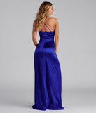 The elegant Rhiannon One-Shoulder Satin Long Dress is a royal blue satin bridesmaid dress crafted with luxe fabric, ideal for modern weddings and traditional bridal parties.