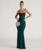 Turn heads at Prom 2025 in this teal prom dress, where statement-making details meet the iconic style of the Addison Glitter Mesh Formal Dress .