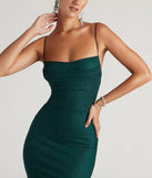 Turn heads at Prom 2025 in this teal prom dress, where statement-making details meet the iconic style of the Addison Glitter Mesh Formal Dress.