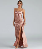Turn heads at Prom 2025 in this copper prom dress, where statement-making details meet the iconic style of the Brooklyn Satin Ruched Formal Dress .
