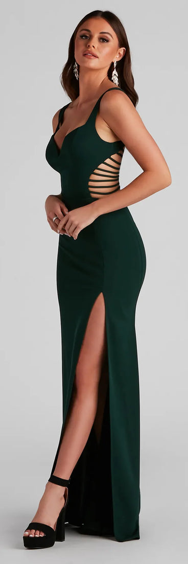 Turn heads at Prom 2025 in this hunter green prom dress, where statement-making details meet the iconic style of the Clarissa Cutout Detail Mermaid Dress .