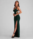 Turn heads at Prom 2025 in this hunter green prom dress, where statement-making details meet the iconic style of the Clarissa Cutout Detail Mermaid Dress .