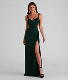 Turn heads at Prom 2025 in this hunter green prom dress, where statement-making details meet the iconic style of the Clarissa Cutout Detail Mermaid Dress.