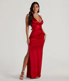 Turn heads at Prom 2025 in this red prom dress, where statement-making details meet the iconic style of the Sam Formal Satin Open Back Dress .