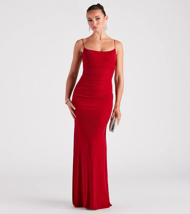 The Mckayla Formal Scoop Neck Dress is an elegant red formal dress in a rich seasonal color and with unique design accents that make dressing up for winter parties, holiday balls, or festive gatherings effortless!