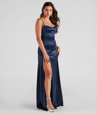 Turn heads at Prom 2025 in this navy blue prom dress, where statement-making details meet the iconic style of the Marissa Formal Satin Cowl Neck Dress .