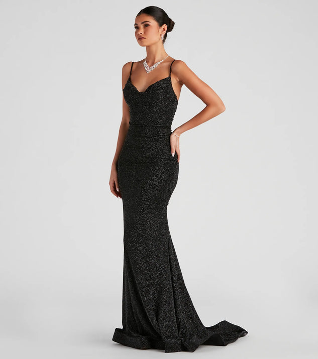 The Shay Formal Lurex Glitter Dress is a shimmery black glitter dress that catches the light beautifully, perfect for any special outfit like Winter Formal attire, clubwear, or a wedding guest dress.