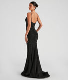 The stunning Shay Formal Lurex Glitter Dress provides a chic silhouette and party-ready details that make it a standout black dress for cocktail events, New Year's Eve parties, or as a winter wedding guest look.