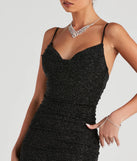 The stunning Shay Formal Lurex Glitter Dress provides a chic silhouette and party-ready details that make it a standout black dress for cocktail events, New Year's Eve parties, or as a winter wedding guest look.
